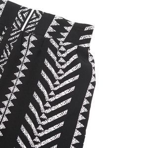Close-up detail of geometric zigzag pattern on high waist long skirt fabric