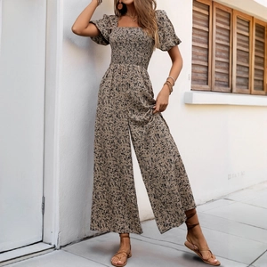 Light brown floral jumpsuit with square neck, smocked chest and wide leg design