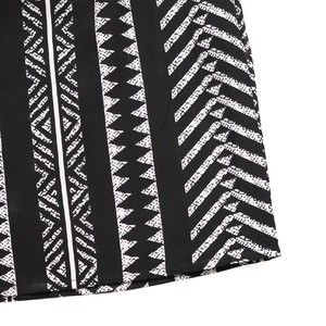 Detailed view of bohemian black and white geometric pattern on lightweight chiffon fabric
