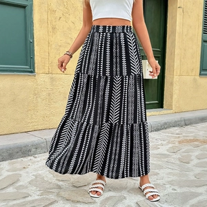 Summer high-waisted tiered maxi skirt featuring ethnic geometric prints and boho patterns