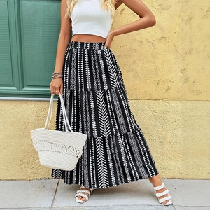 Summer bohemian tiered maxi skirt with high waist and geometric tribal print pattern