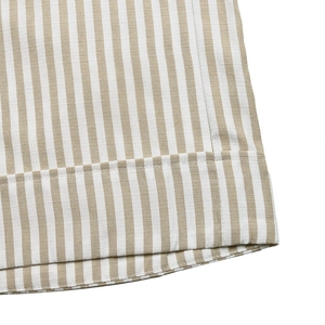 Detail of high-quality vertical striped linen fabric with neat hemmed sewing craftsmanship