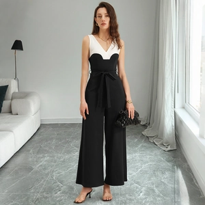 Eleganter schwarz-weißer V-Ausschnitt Jumpsuit mit Taillenband und weitem Beinschnitt