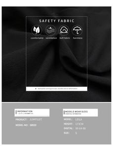 Detail of soft breathable black jumpsuit fabric showing safe and ventilation features