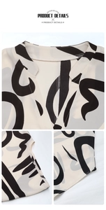 Macro detail of V-neckline and abstract geometric pattern on women summer blouse