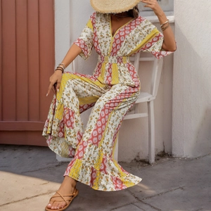 Bohemian floral printed wide leg jumpsuit with deep V-neck and elastic waist