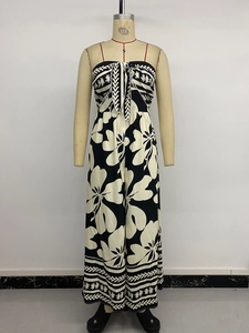 Detailed close-up of a floral print jumpsuit with tie-front bow and wide leg cut
