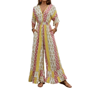 Bohemian floral print V-neck jumpsuit with elastic waist and ruffled hem details
