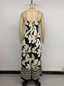 Detail of the elastic smocked back and floral print on a summer vacation jumpsuit