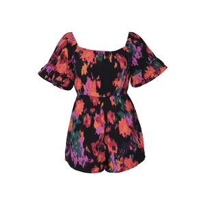 Detail of floral romper showing multi-color abstract print and ruffled sleeve design