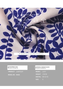 Detail view of ethnic floral fabric texture and model size specifications for summer jumpsuit