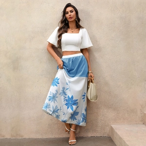 Summer two-piece set with white crop top and blue floral high-waist A-line maxi skirt