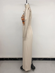Detail of bohemian embroidery and smocked side on the summer sleeveless jumpsuit