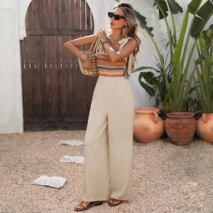 Ethnic print sleeveless jumpsuit with high-waist wide-leg trousers and shoulder ties