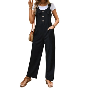 Women's black casual overalls with wide legs and button details over a white t-shirt