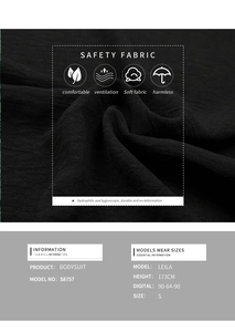 Détail du body noir à col bénitier respirant avec texture douce et caractéristiques tissu