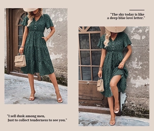 Detail view of deep green polka dot dress with V-neck, buttons and layered ruffle skirt