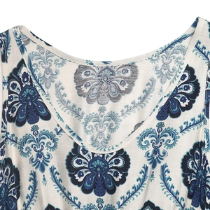 Detail of V-neckline with ethnic mandala print on breathable cotton linen dress