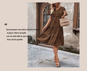 Detail of leopard print v-neck dress featuring tiered skirt and drawstring waist details