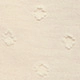 Makrodetail von beigefarbenem Jacquard-Stoff mit 3D-Rautenmuster für Damenoberteile