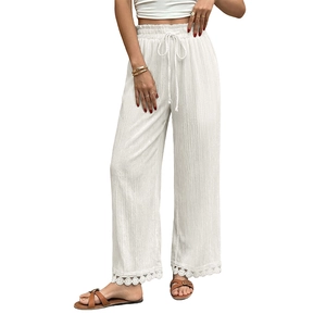 Pantaloni estivi bianchi da donna a gamba larga con pizzo e coulisse in vita