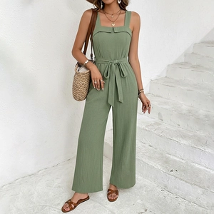 Sage green sleeveless wide leg jumpsuit with waist tie and pleated linen fabric texture