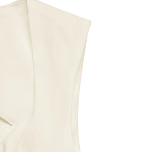 Detail of professional twill fabric and neat stitching on cream white two-piece set