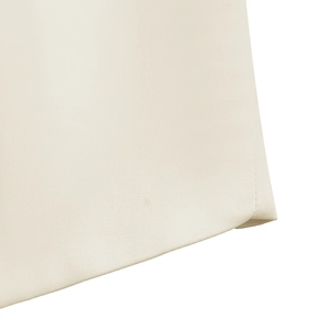 Close-up detail of high-quality beige twill woven fabric for elegant office suit set