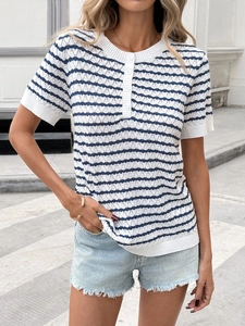 Detail of a blue and white striped knit shirt with a three-button Henley neckline style