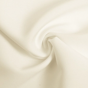 Close-up of white office suit fabric showing fine diagonal weave texture and silky finish