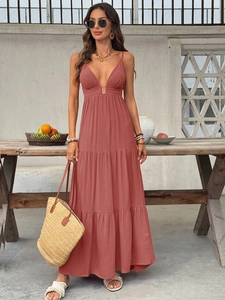 Elegant brick red deep V-neck maxi dress with tiered layers and minimalist summer resort style