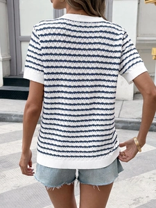 Rear view of a casual blue and white wavy striped knitted short sleeve top for women
