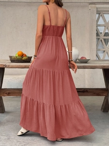 Deep V-neck coral red tiered maxi dress with ruched back for a summer beach vacation