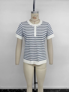 Detail of blue and white striped knit shirt with buttoned half-placket and ribbed texture