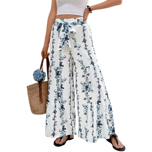 Bohemian high-waist wide-leg pants with blue floral print and waist tie-up detail