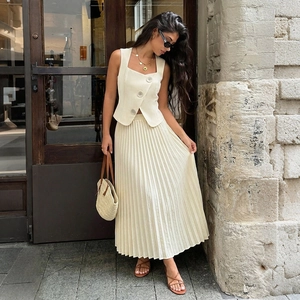Two-piece cream sleeveless vest top and pleated skirt set for chic office wear