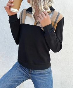 Detail of plaid splicing and diamond-quilted fabric on women long sleeve pullover