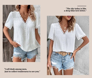 Detailed view of white V-neck blouse featuring Swiss dot texture and delicate lace trim