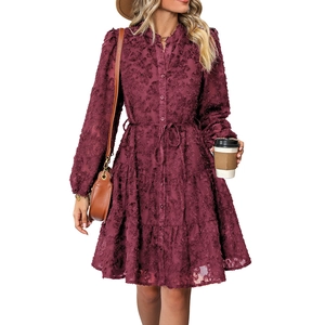Close-up of wine red long sleeve dress with leaf texture and waist drawstring detail