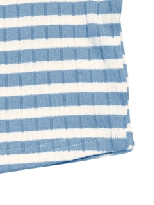 Close-up of blue and white striped knit fabric with textured ribbed finish and neat stitching