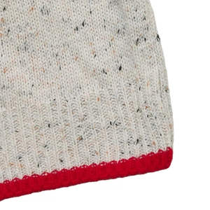 Macro view of speckled grey knit fabric with a contrasting bright red ribbed hem