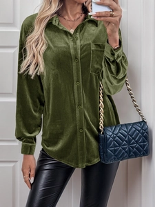 Detailed view of olive green velvet long sleeve shirt with front pocket and buttons