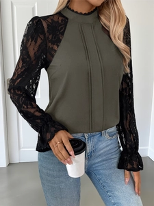Detail of mock neck lace sleeves and pleated olive green blouse for women