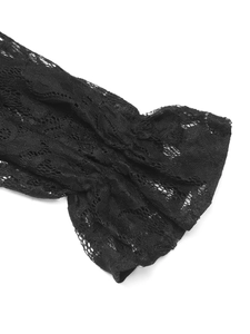 Close-up of elegant black lace fabric with delicate floral patterns and hollow texture