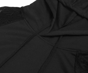 Detail of black hooded dress showing floral lace stitching and round drawstring
