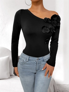 Slim fit black one-shoulder bodysuit with 3D floral accents and elegant long sleeve