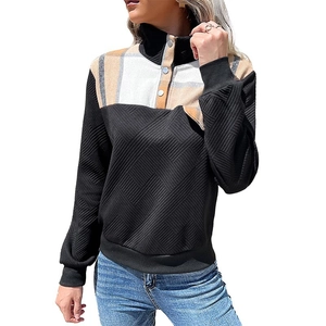 Women's long sleeve black quilted sweatshirt with colorful plaid patchwork and button neck