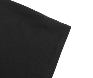 Close-up of black hoodie dress fabric showing high-quality double stitching details