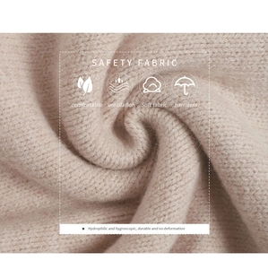 Close-up of soft beige knit fabric showing breathable texture and durable weave