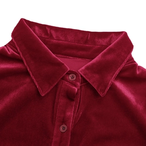 Close-up of wine red velvet shirt collar featuring premium texture and tonal buttons